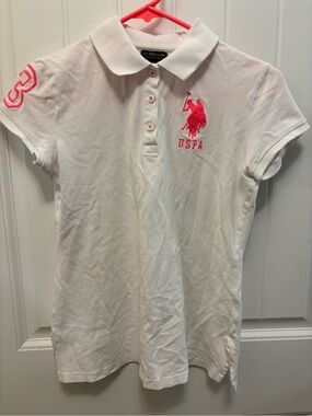 U.S. Polo Assn. White Polo with Pink Embroidered Logo with collar detail. Size S